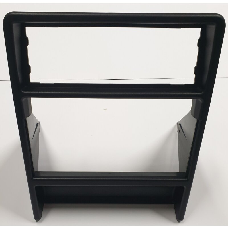 Frame console around radio and fan control panel