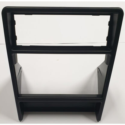Frame console around radio and fan control panel